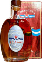 Liberacion+15+Anos+Rum+Cuba+-+unser+Geheimtipp - Liberacion Ron de Cuba 15 Jahre mit 700 ml. und 40 % Volumen. Dieser Rum liegt in 99 % aller Tastings die wir machen unter den ersten drei. Perfekt auch zur Zigarre aus Kuba. Geheimtipp auch aus Wein Gourmet 10/02.  Die Flasche ist jetzt im neuen Design und wird mi...